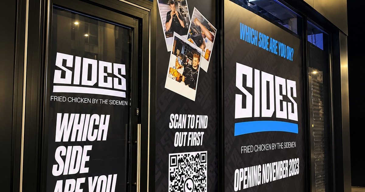 Shop window graphics with a bold headline and a QR code