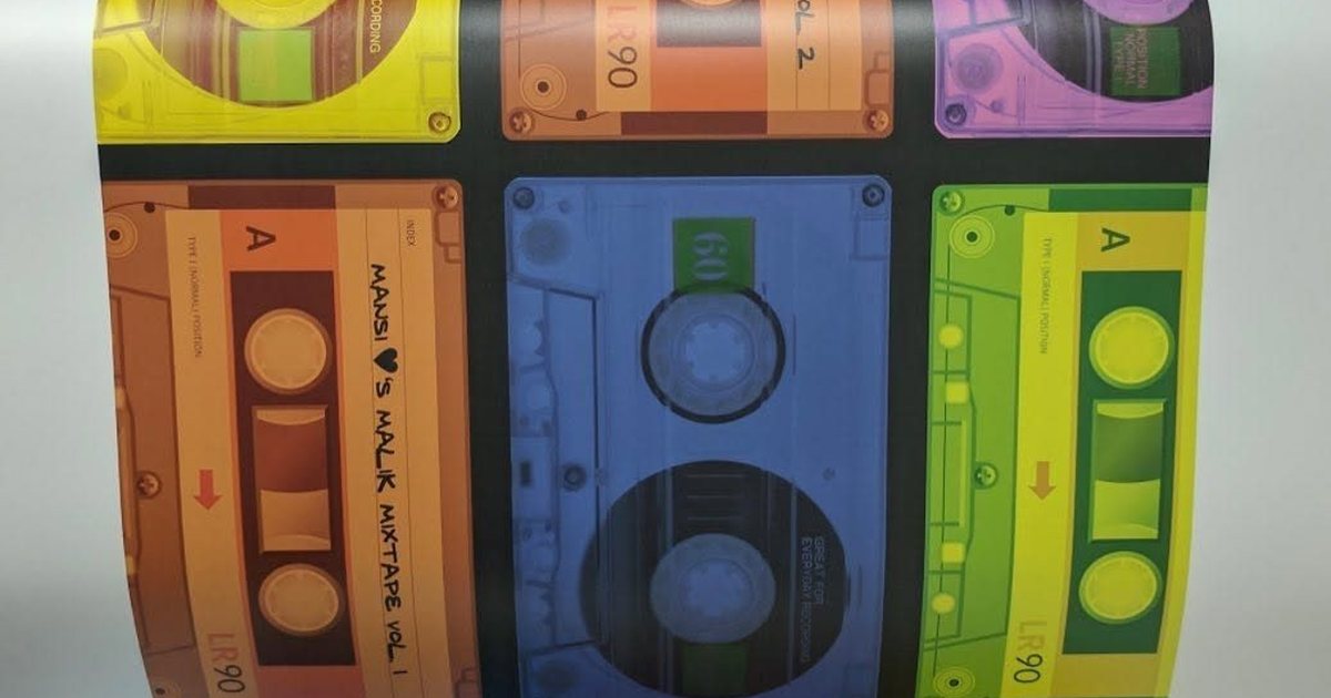 Personalised cassette tape wall vinyl coming off a wide format printer