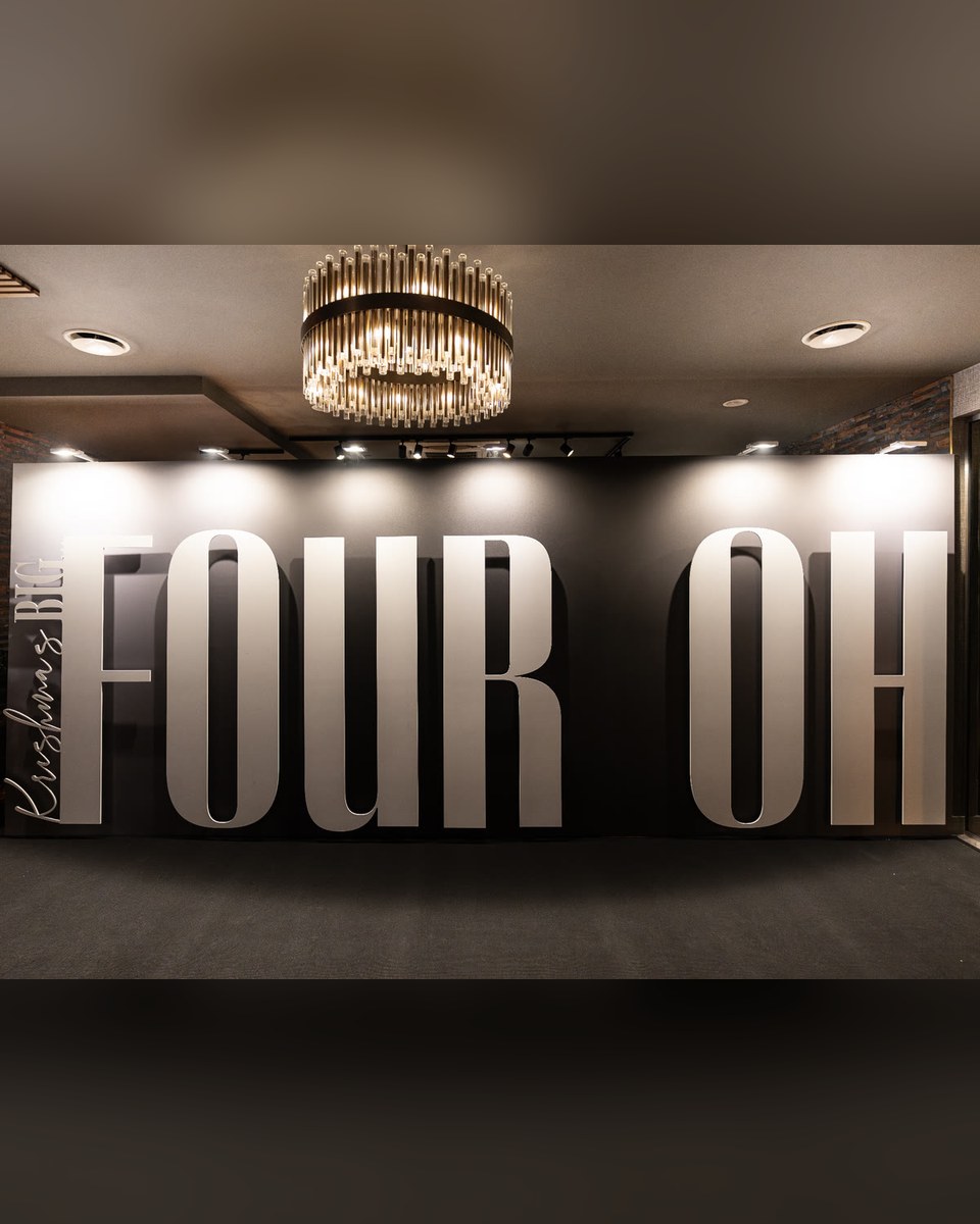 FOUR OH 40th birthday backdrop with giant cut letters, printed by Print Station
