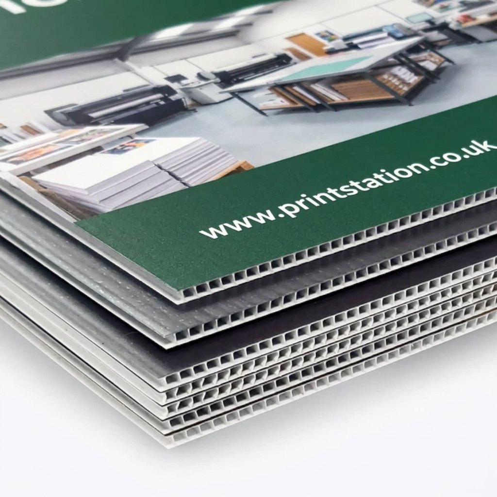 Stack of printed Correx boards showing the fluted edge