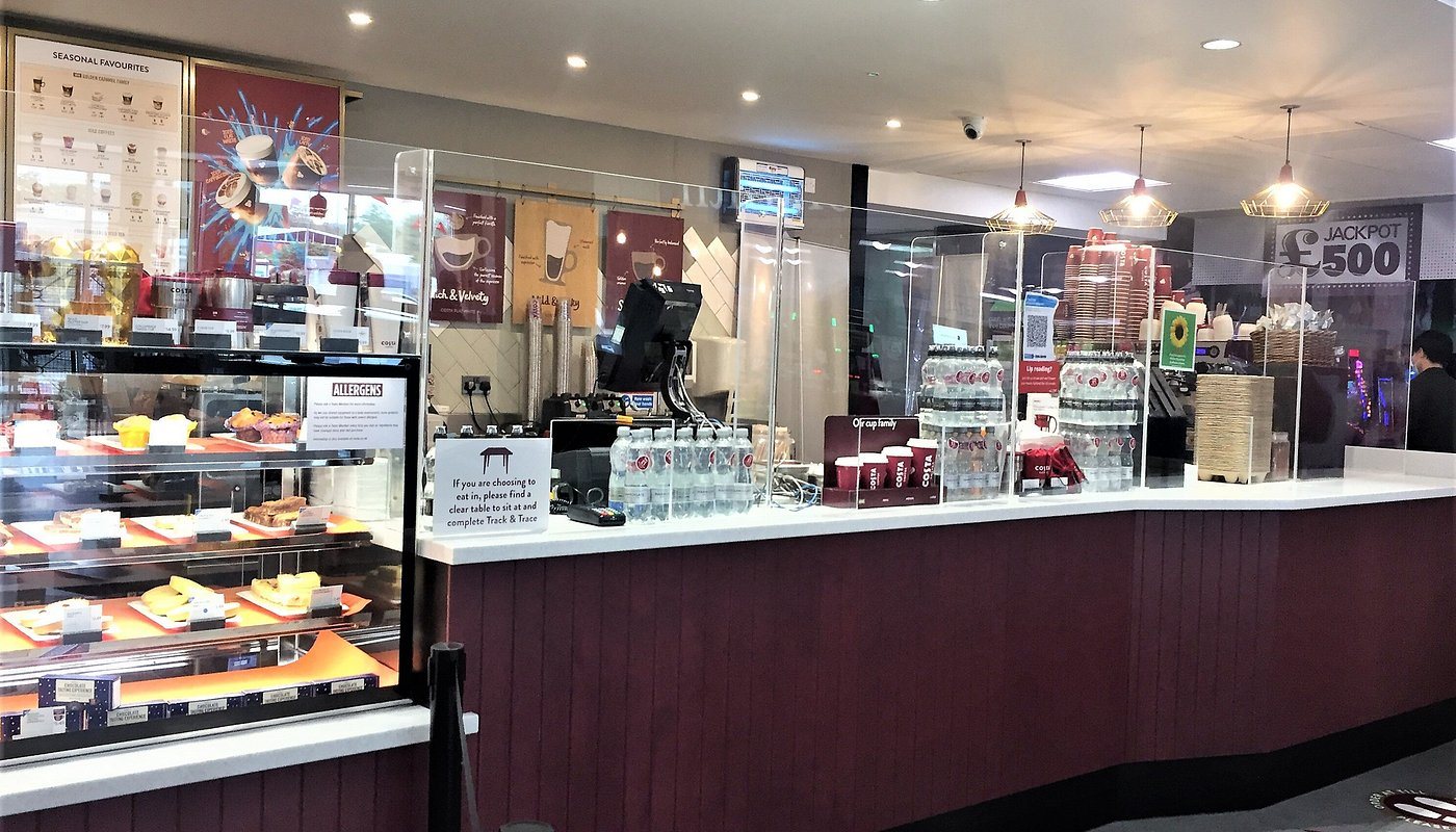 A full run of clear screens along the counter at Costa Coffee, M1 Watford