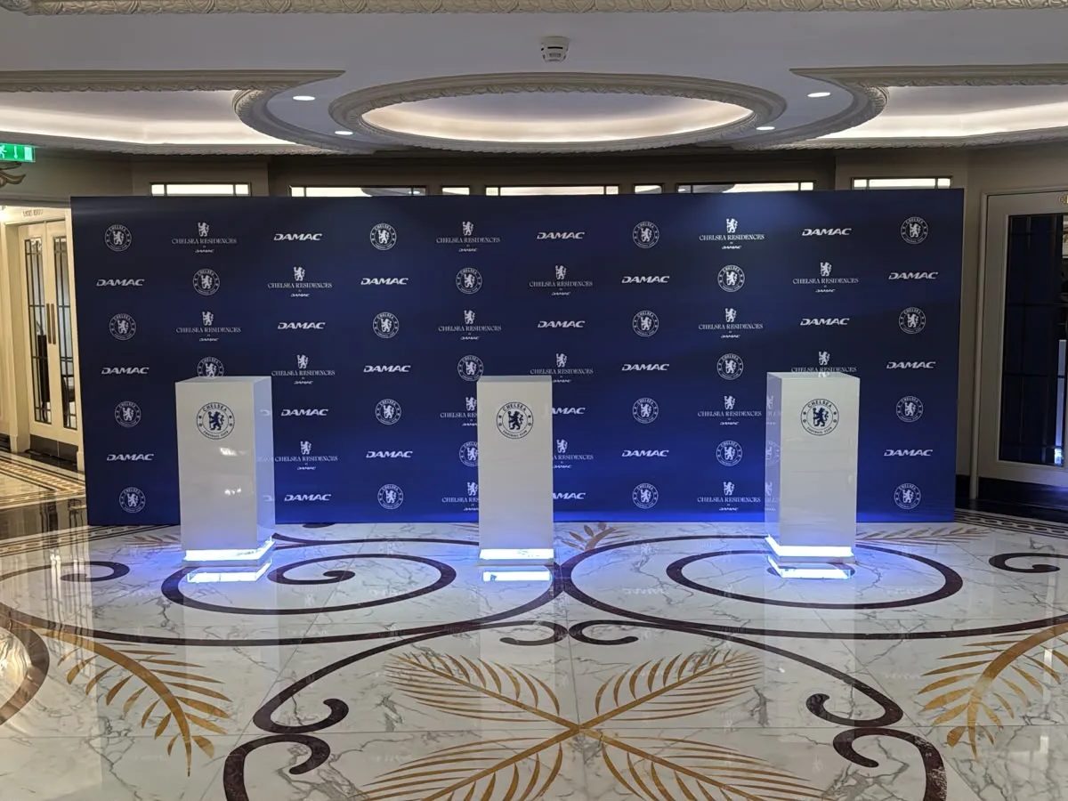 Printed step and repeat media wall and plinths in the hotel foyer