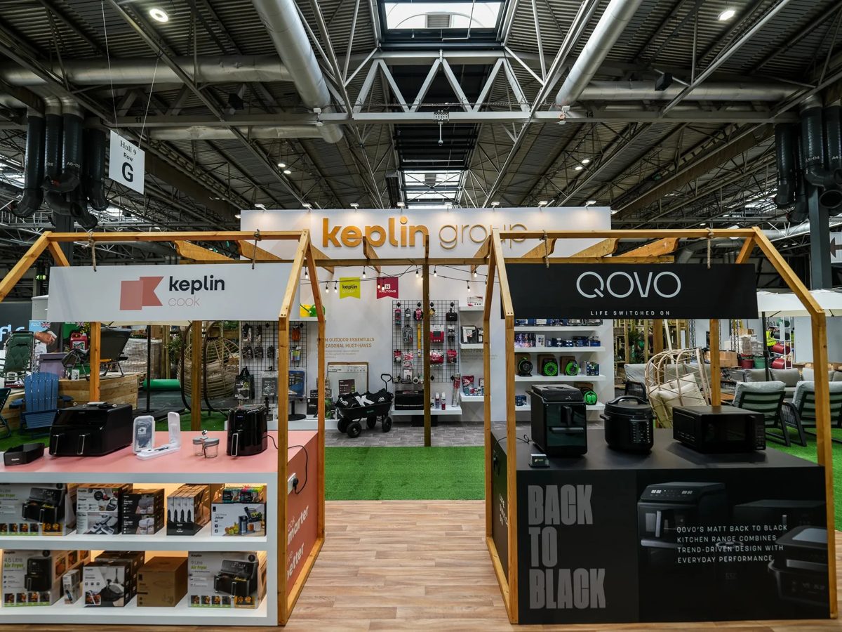 Keplin Group stand at Glee Birmingham with timber house frames and branded counters