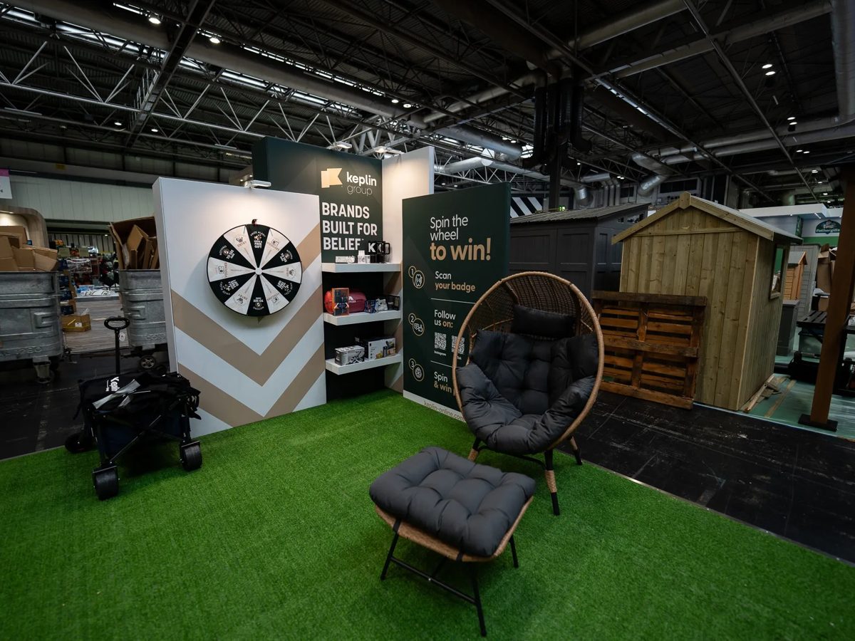 Spin the wheel prize wall and printed brand panels at Glee