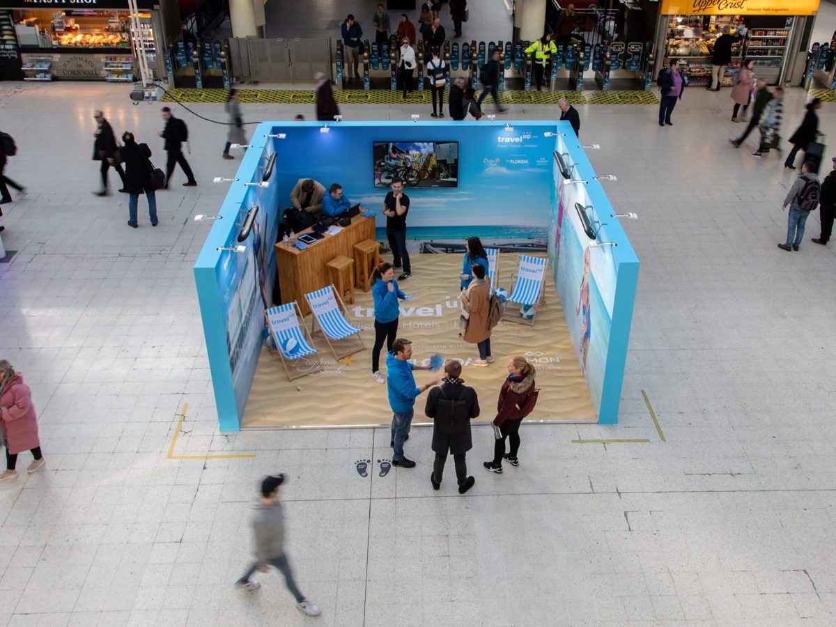 Aerial view of the pop up with printed sand floor and Visit Florida graphics