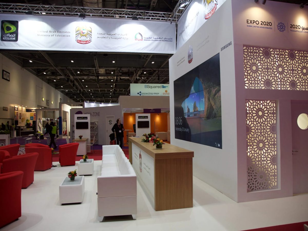 Backlit laser cut screens and white lounge seating