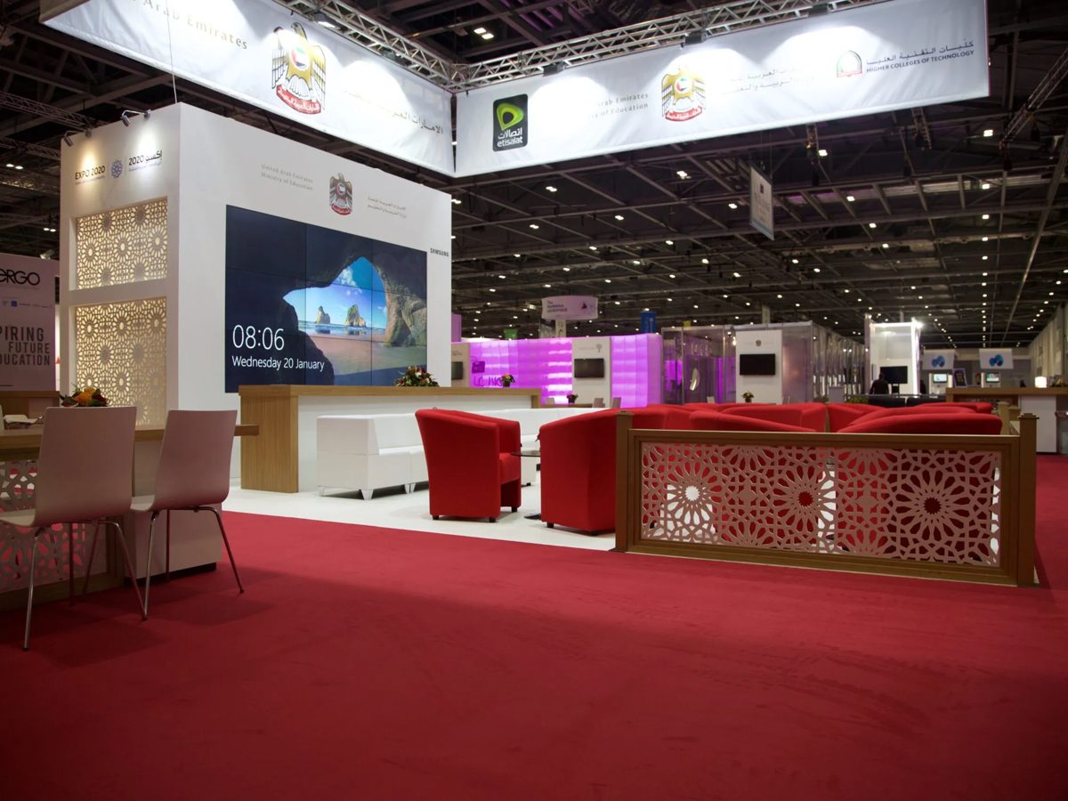 Video wall set into the printed stand with Expo 2020 branding