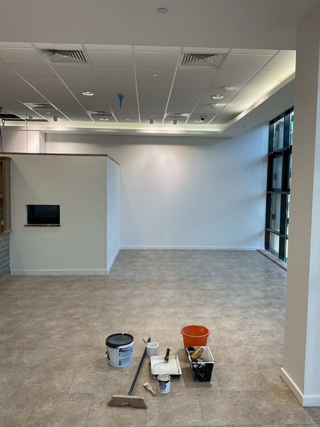 Bare walls and floor, ready for the build