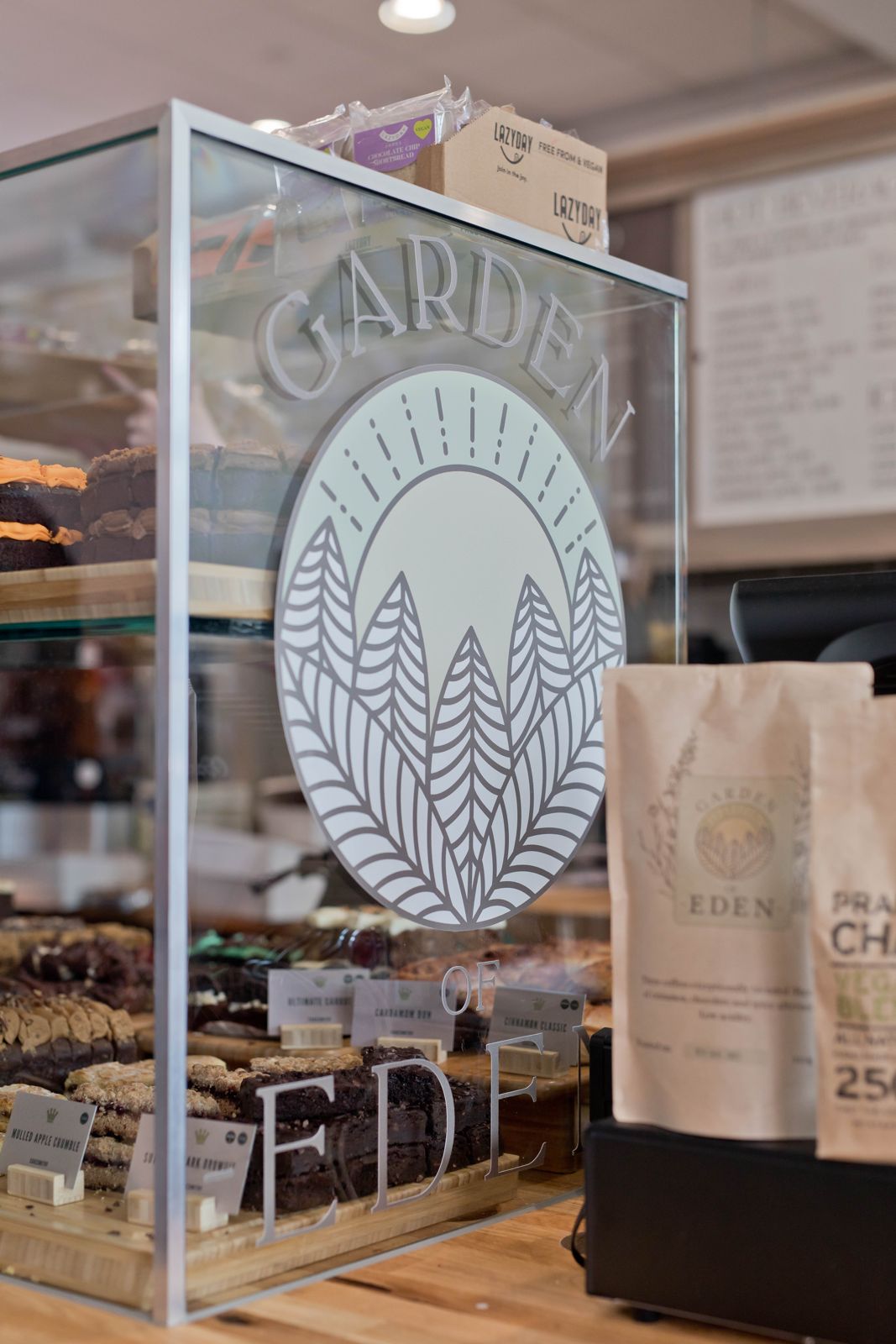 Garden of Eden logo on the cake cabinet