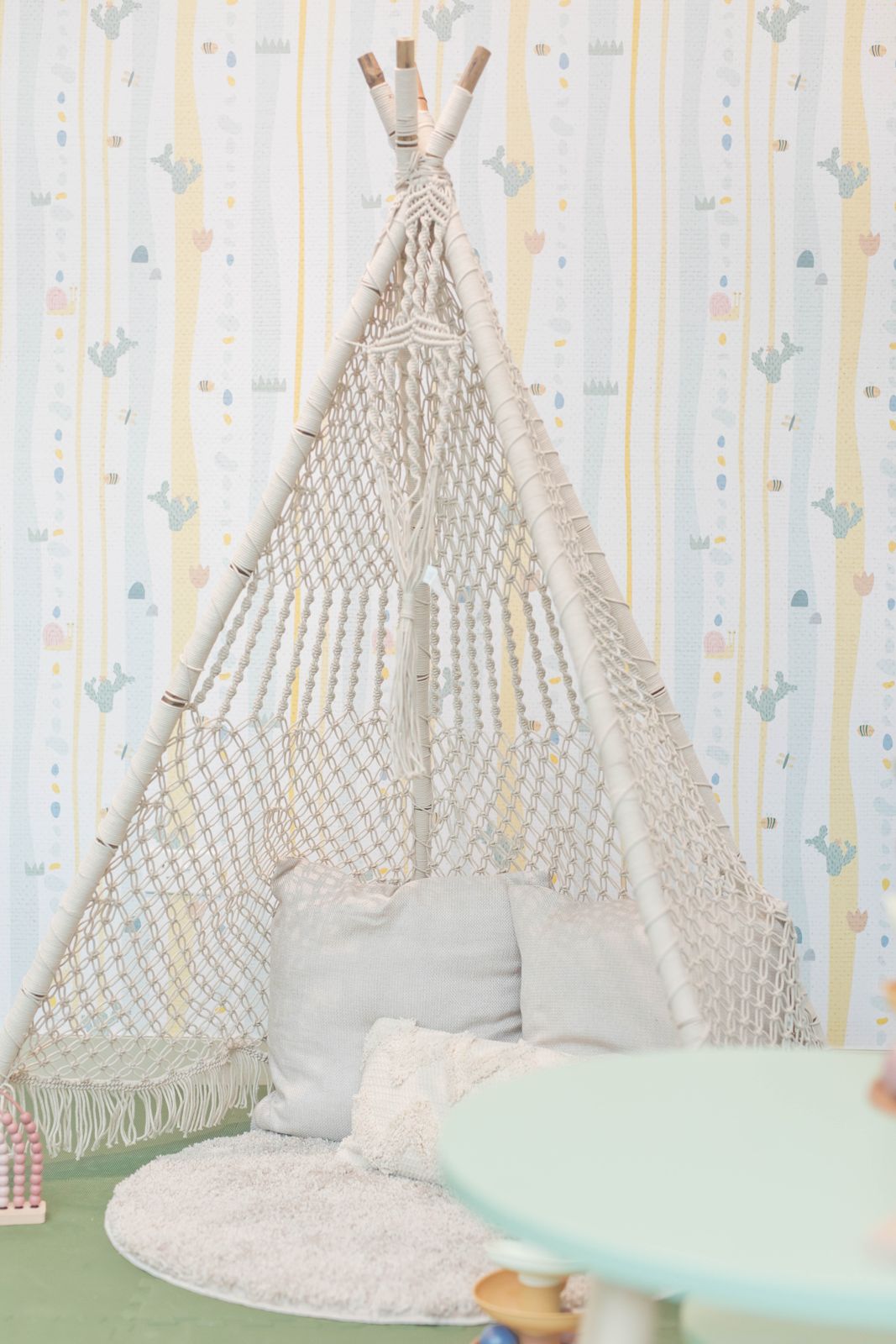 Play corner against the patterned wall covering