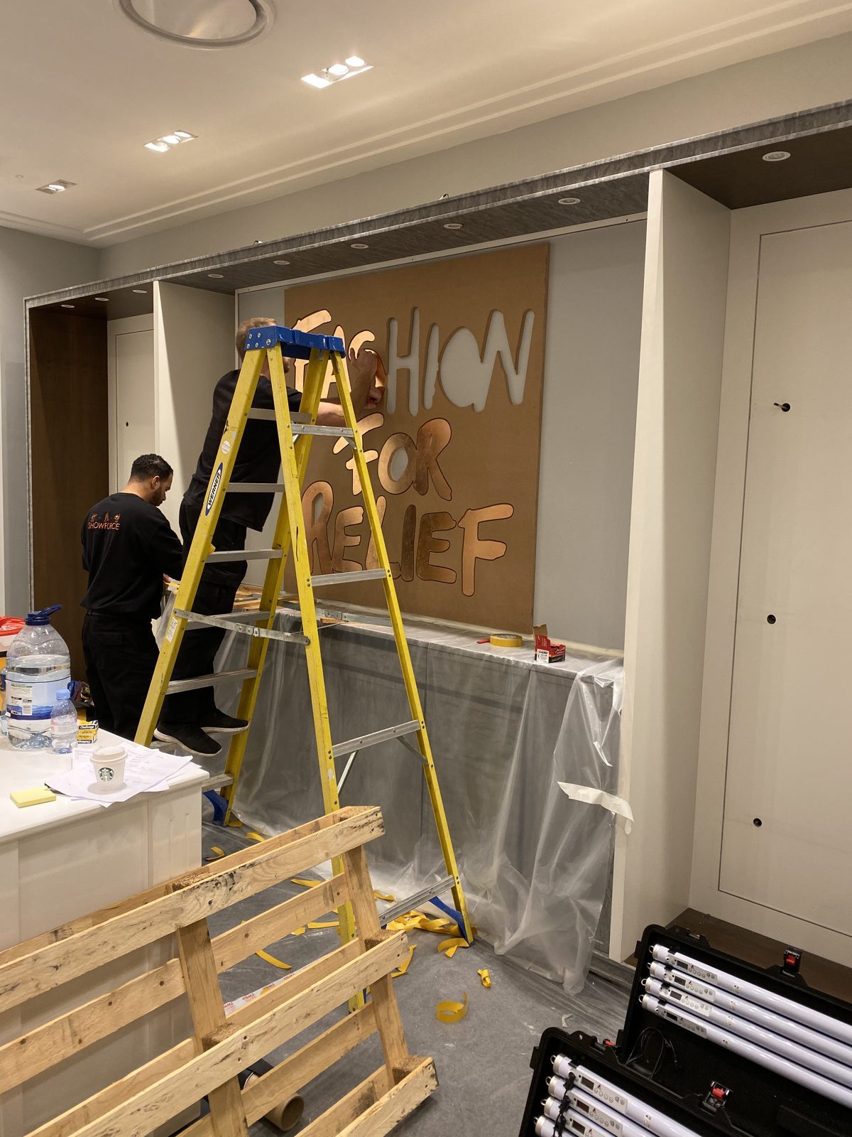 Fixing the logo to the feature wall