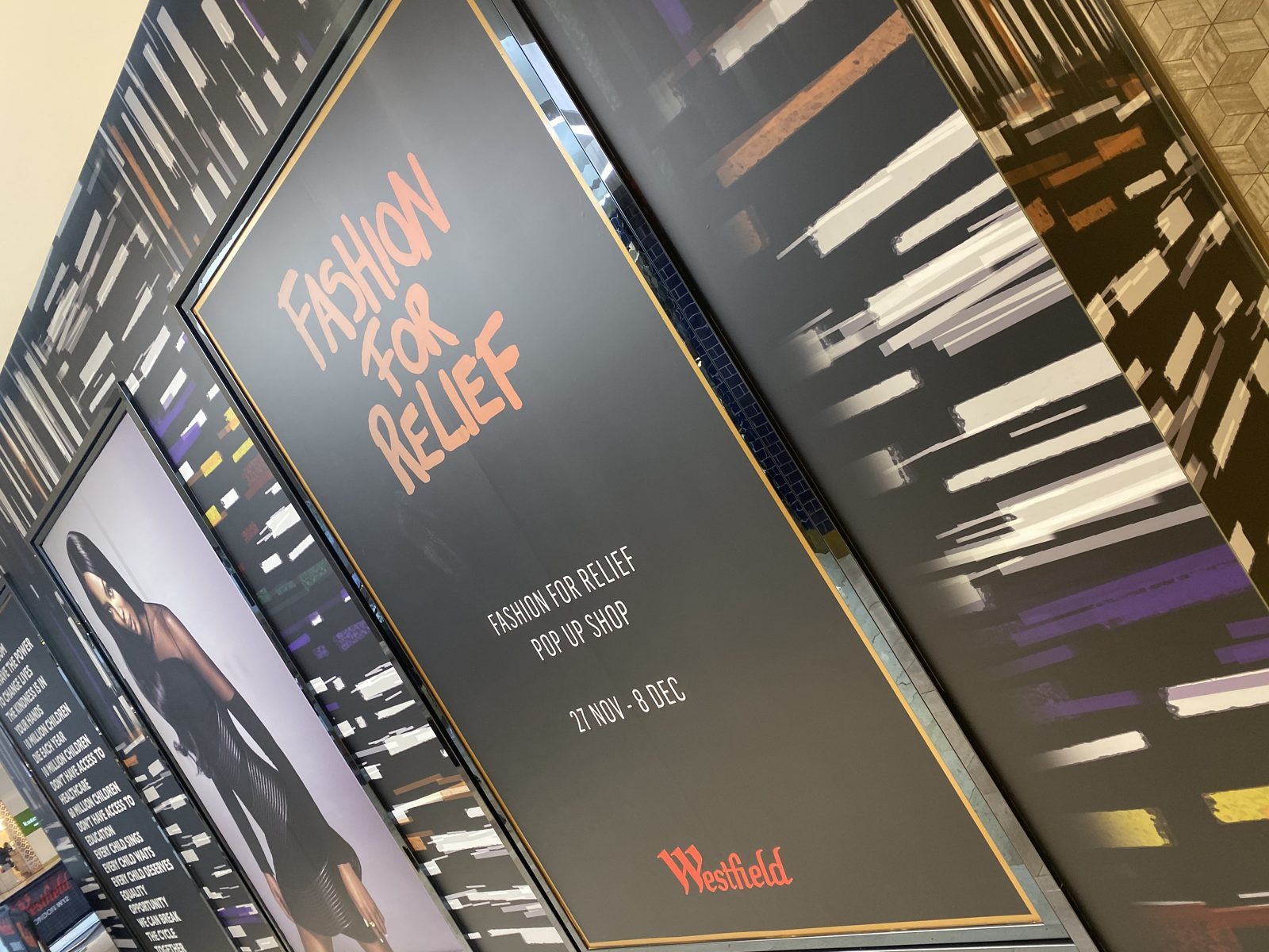 Close up of the pop up shop poster within the storefront wrap