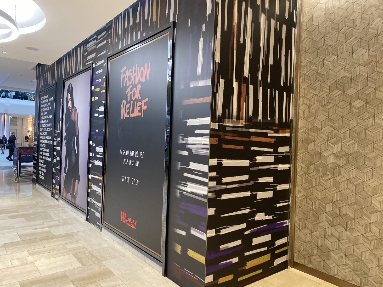Bold brushstroke artwork carried around every corner of the shopfront