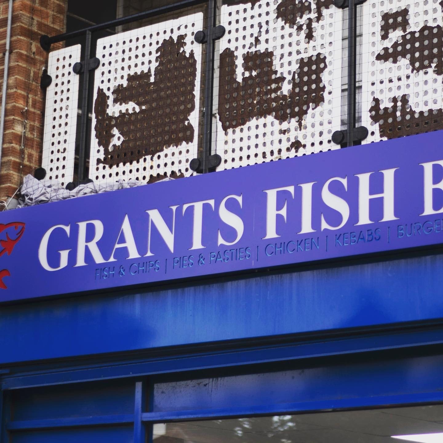Grants Fish Bar shop sign in blue ACM Dibond with routed lettering and a red fish logo