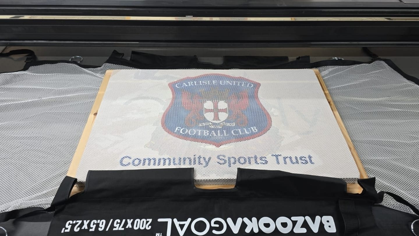 Carlisle United Football Club Community Sports Trust crest printed onto a white pop up goal net on our Fuji UV flatbed