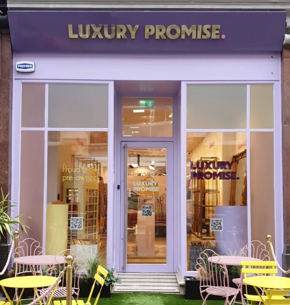 Lilac Luxury Promise shopfront with gold acrylic lettering on a purple ACM fascia board above the windows