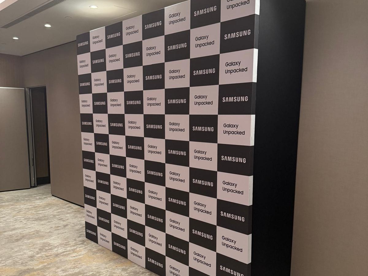 Samsung Galaxy Unpacked step-and-repeat media wall in a hotel event space