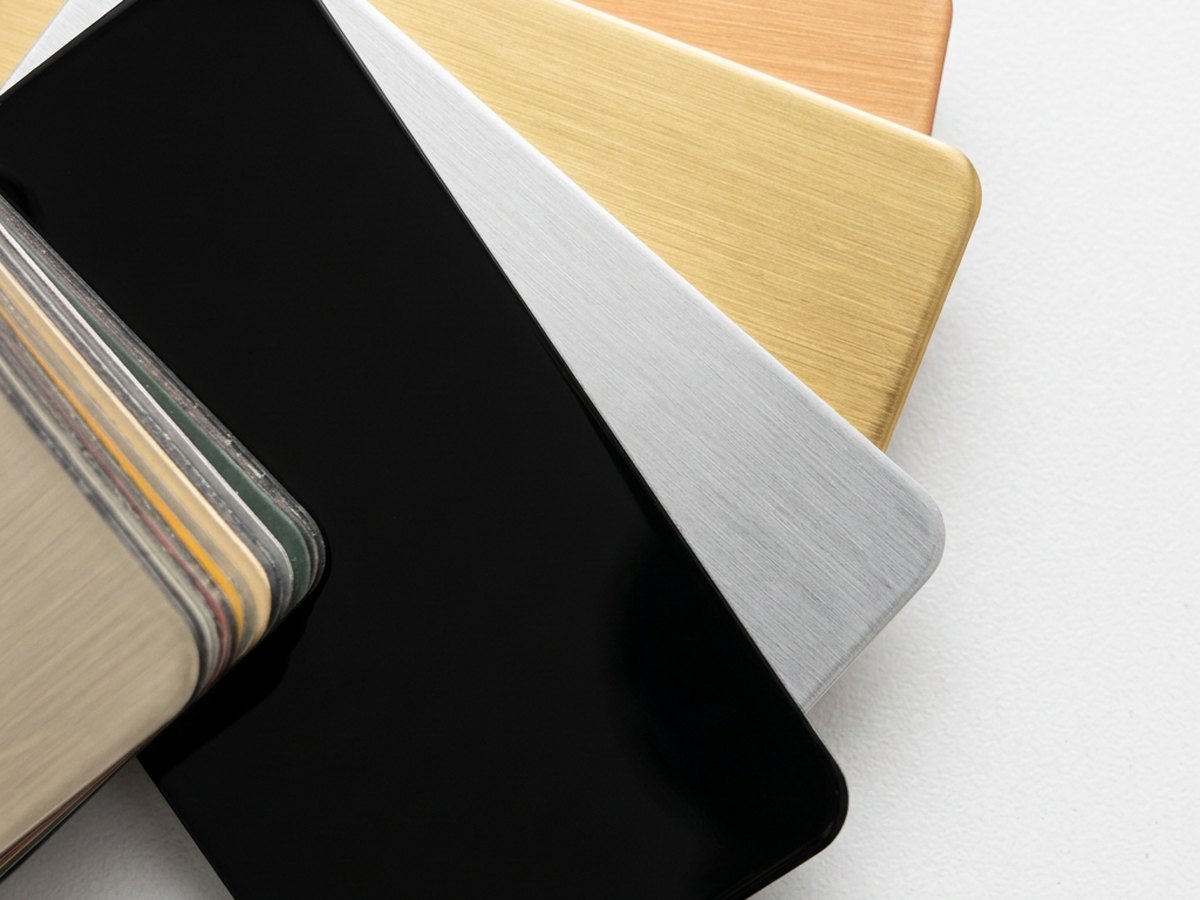 ACM Dibond panel samples in gloss black, brushed silver, gold and copper finishes