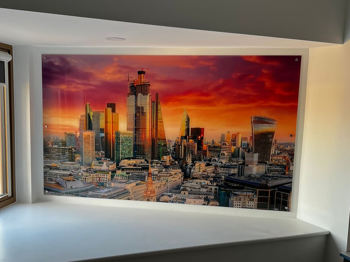 London skyline at sunset printed on a large acrylic panel, wall mounted with stand-off fixings