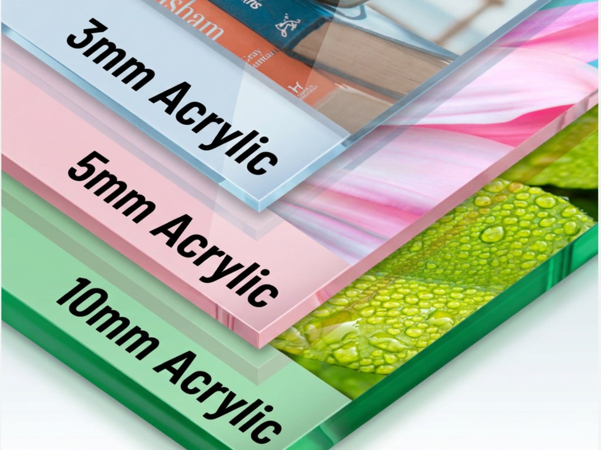 Printed 3mm, 5mm and 10mm acrylic sheets in blue, pink and green stacked to show their thickness