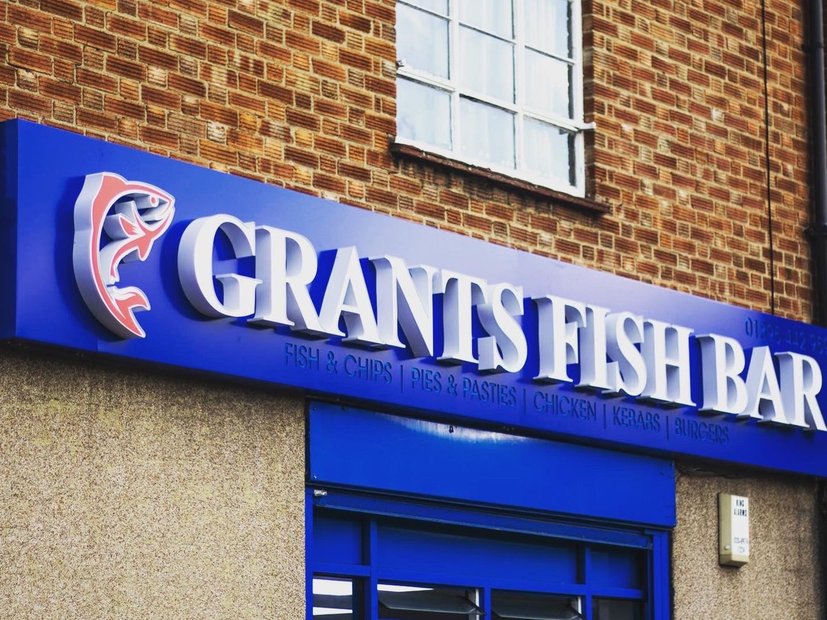 Grants Fish Bar shop sign with built-up 3D letters on a blue fascia