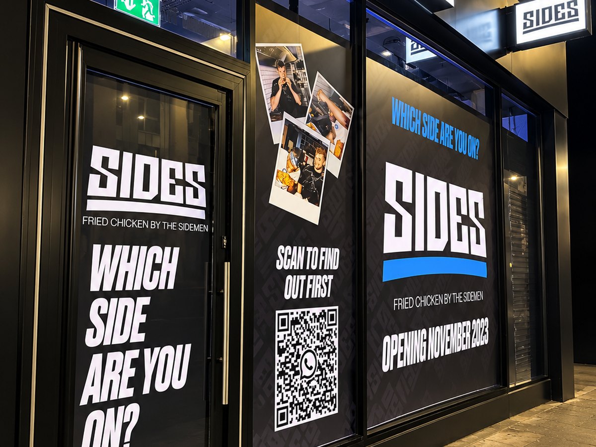 SIDES fried chicken shopfront with printed window graphics and a QR code